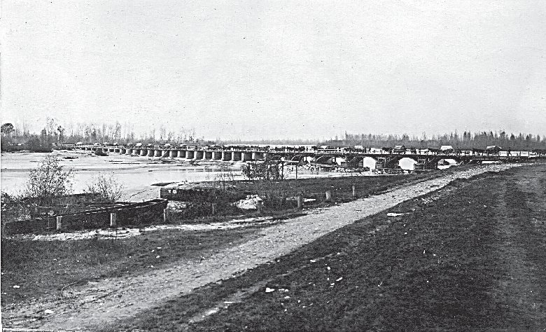 Salmerie austriache mentre attraversano il ponte di Madrisio
